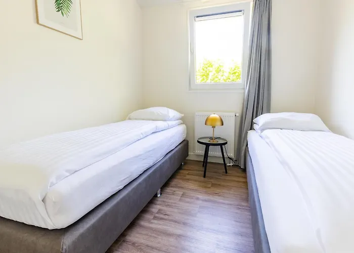 In Netherlands By Scenic Pond Chalet *